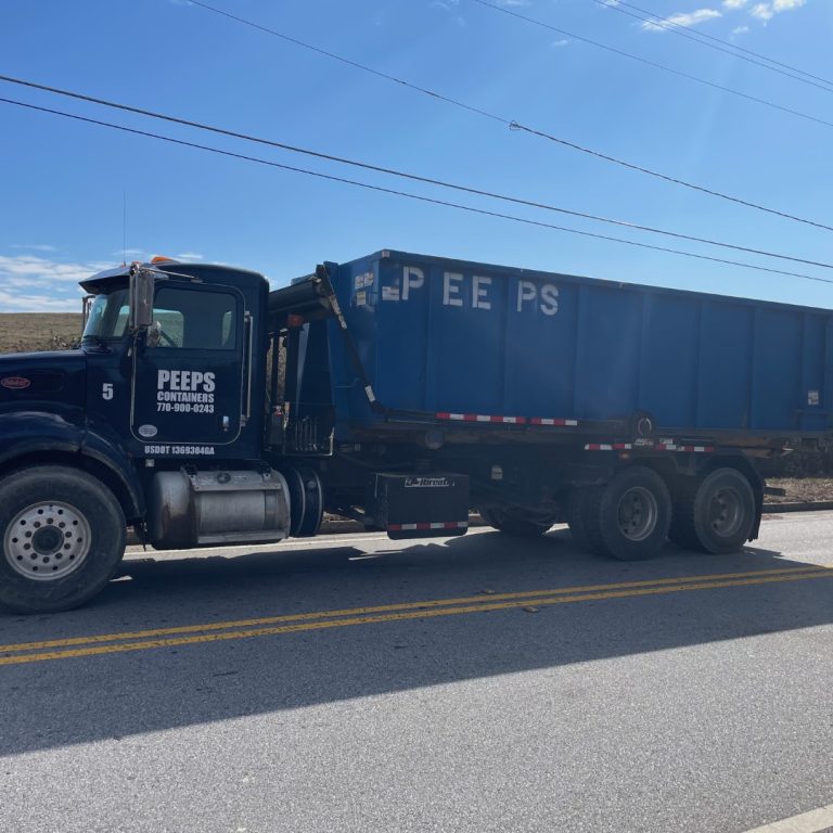 roll-off-dumpster-truck-contractor-service-atlanta-peeps-containers Large roll off construction dumpster delivery for contractor jobsite in Atlanta