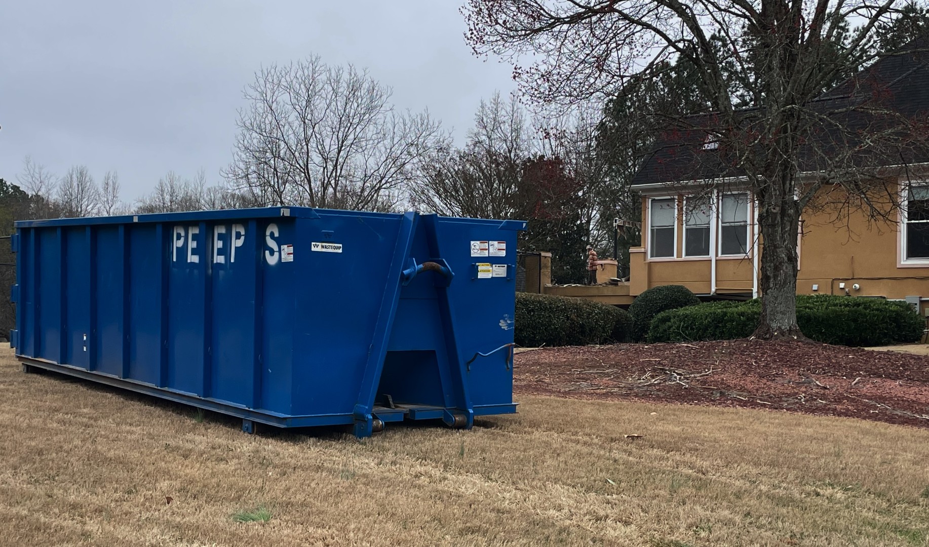 Large dumpster rental for home project in Atlanta yard Peeps Containers - Peeps Containers Large dumpster rental for home project in Atlanta yard Peeps Containers